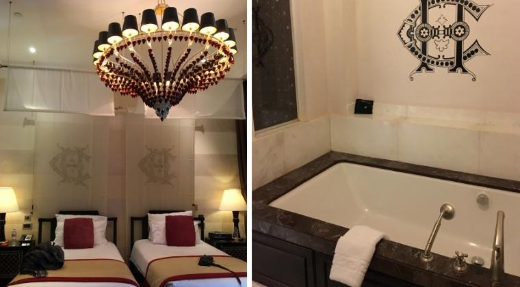 「オールドカタラクトホテル」のスイートルームのベッドルームと大理石のバスルーム